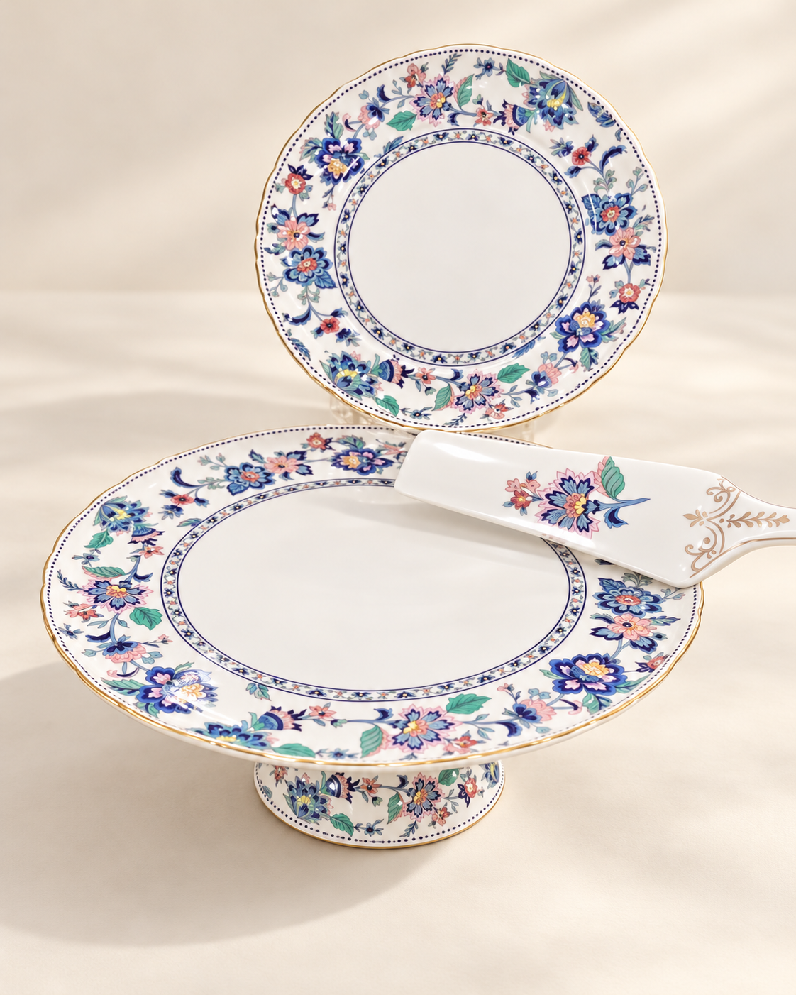 Styled preview of the floral cake stand, plate and server